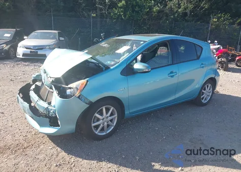 2012 Toyota Prius C from USA, damaged, VIN JTDKDTB36C1030074